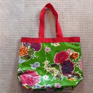 Green and red floral tote bag with plastic coating - Velcro close